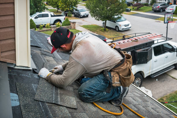 Professional Roofing technician working in Munford, AL
